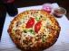 پیتزا مخلوط ویژه خوشمزه و لذیذ در فست فود شاهان