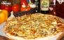 پیتزا هیزمی سنگی در تنور داغ فست فود آروما